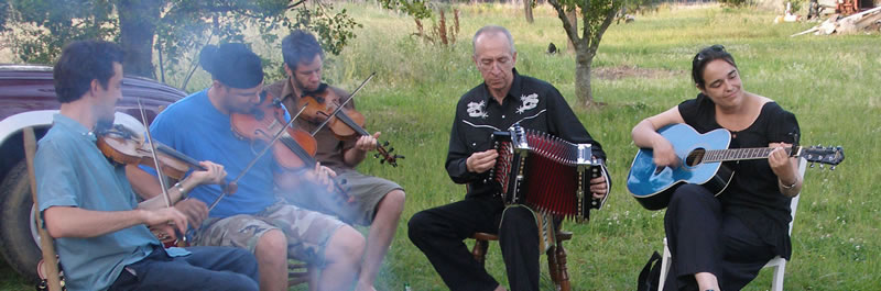 Gerard Dole playing music with friends